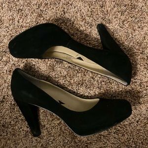 Black suede pumps